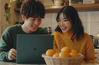Couple purchasing groceries online using a credit card. Convenient and secure way to shop for essentials from the comfort of home.
